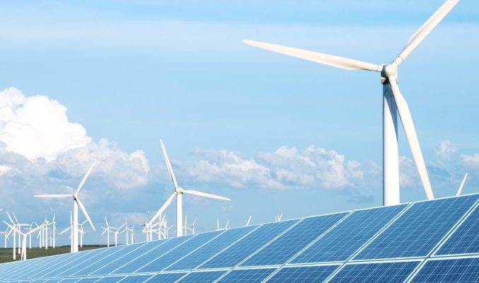 solar-panel-in-green-lawn-with-wind-power